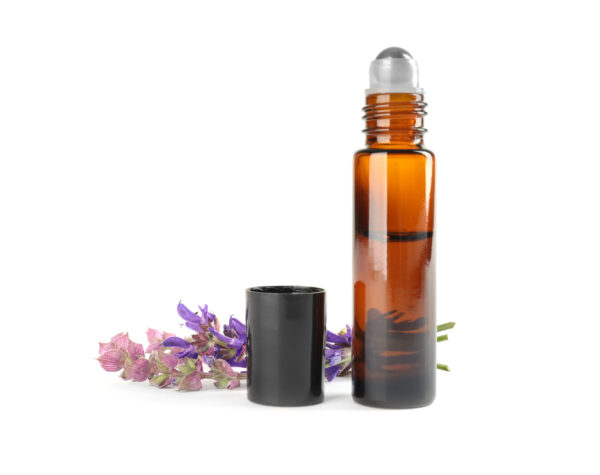 bottle,of,herbal,essential,oil,and,sage,flowers,isolated,on